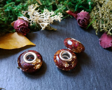 Load image into Gallery viewer, Red rose and gold flakes charm
