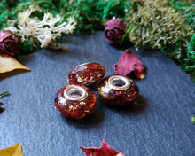 Load image into Gallery viewer, Red rose and gold flakes charm
