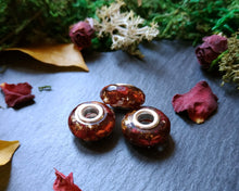 Load image into Gallery viewer, Red rose and gold flakes charm
